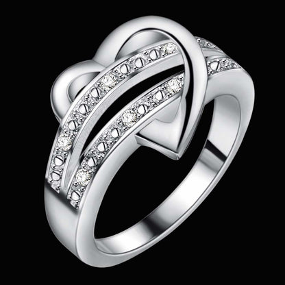Woman's Sparkling Wishbone Heart Ring