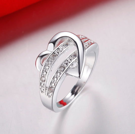 Woman's Sparkling Wishbone Heart Ring