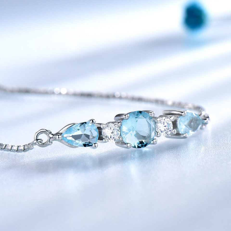 Trinity Sky Blue Topaz Adjustable Tennis Bracelet For Woman