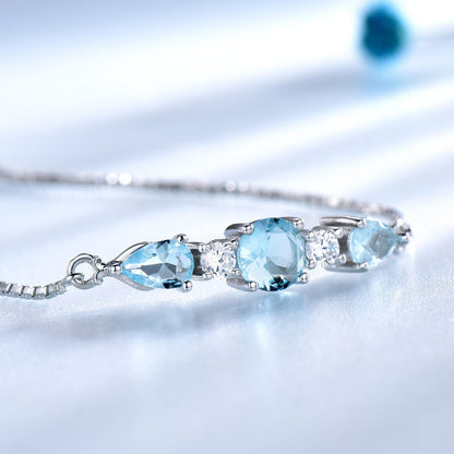 Trinity Sky Blue Topaz Adjustable Tennis Bracelet For Woman