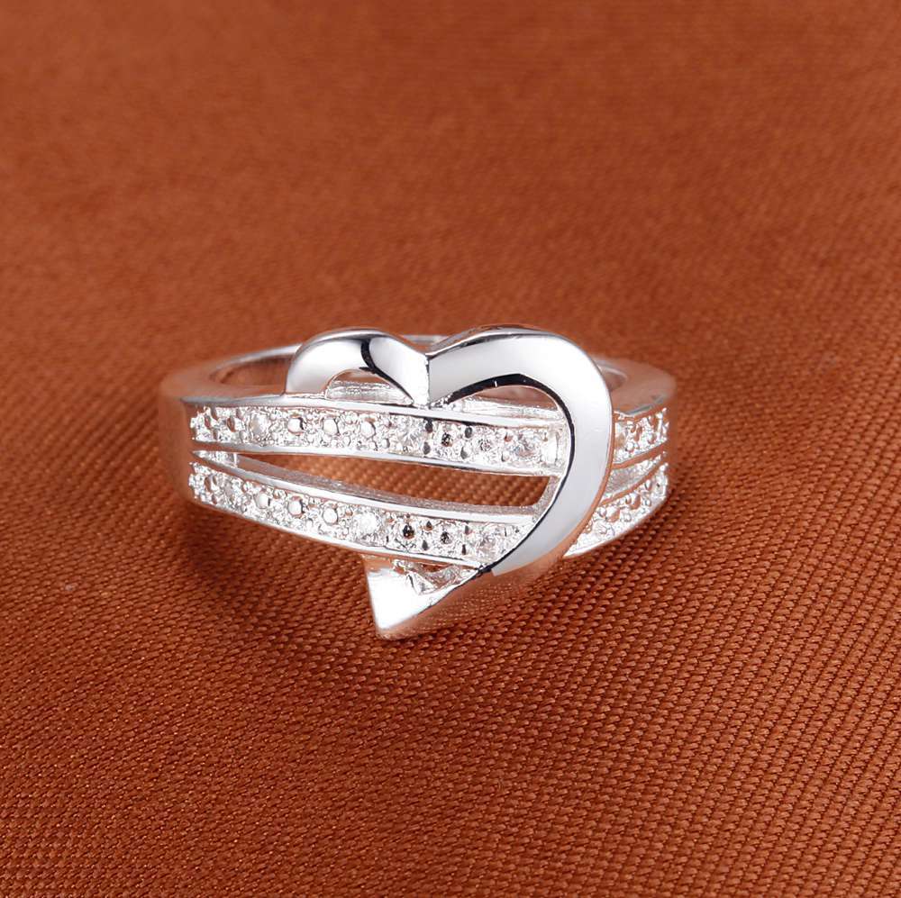 Woman's Sparkling Wishbone Heart Ring