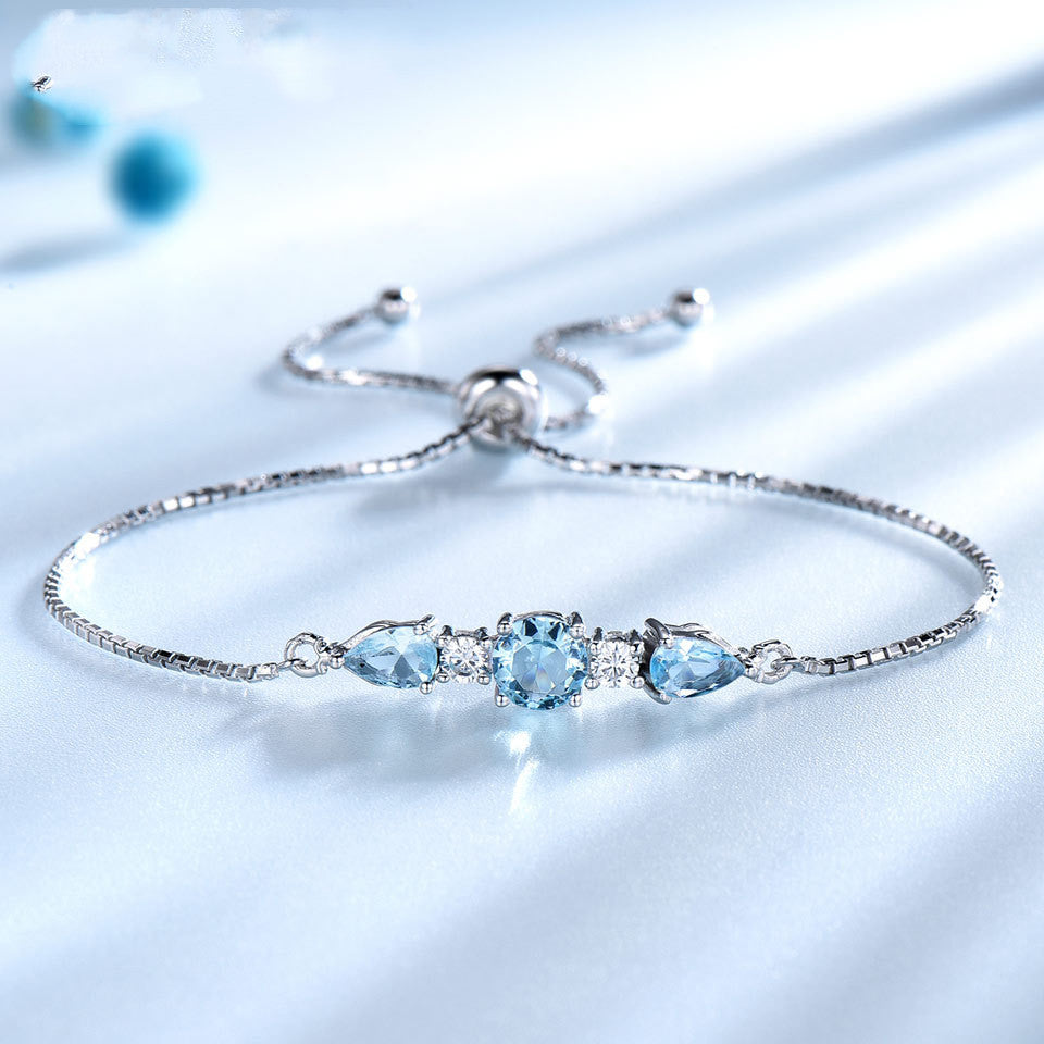 Trinity Sky Blue Topaz Adjustable Tennis Bracelet For Woman