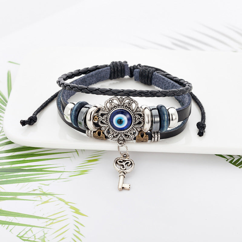 Retro Bohemian Cowhide bracelet & Hollow alloy insert Evil eye