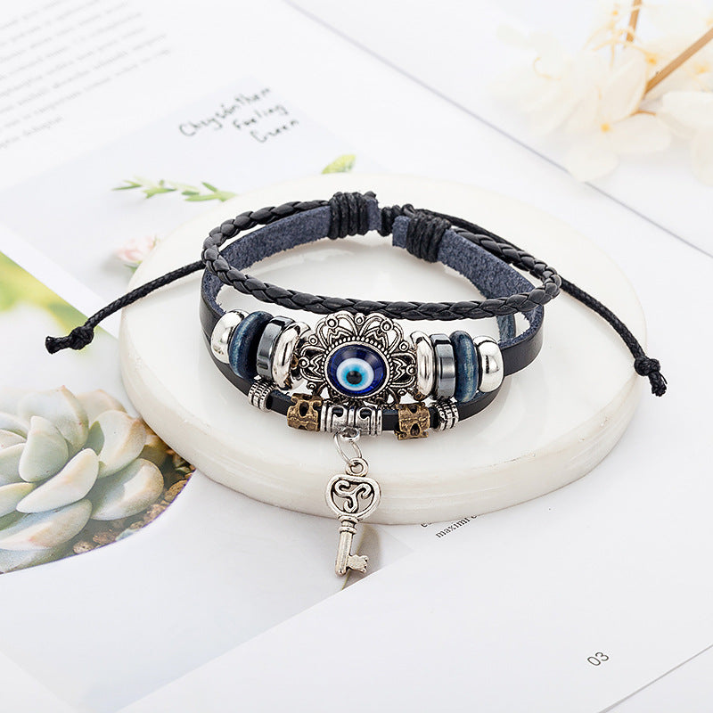 Retro Bohemian Cowhide bracelet & Hollow alloy insert Evil eye