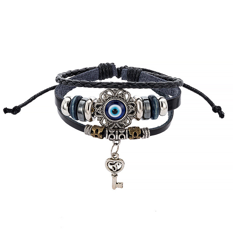 Retro Bohemian Cowhide bracelet & Hollow alloy insert Evil eye